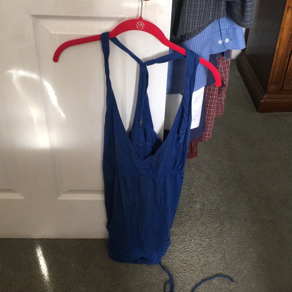 Blue tank top with tie bottom and front pockets